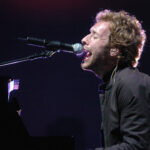 Coldplay's Chris Martin sings